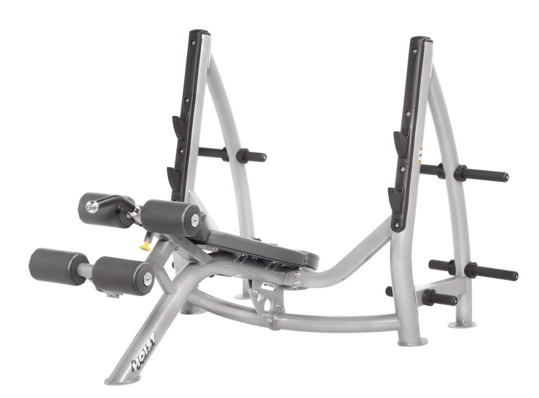 Hoist commercial Olympic decline platinum slate grey bench with barbell rack and integrated weight plate storage for lower chest training