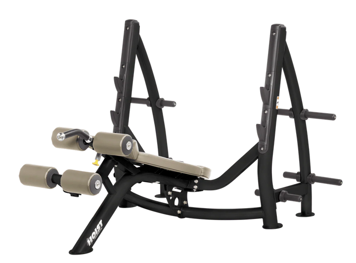 Hoist commercial Olympic decline suede bench with barbell rack and integrated weight plate storage for lower chest training