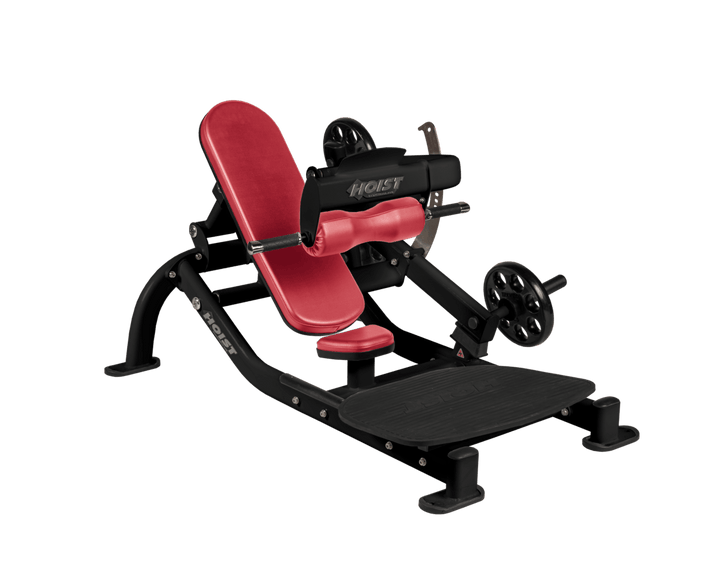 Angled view of AMB Matte Black glute thrust machine showing foot platform, seat, and weight plate loading positions