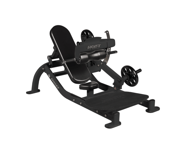 Angled view of Matte Black glute thrust machine showing foot platform, seat, and weight plate loading positions