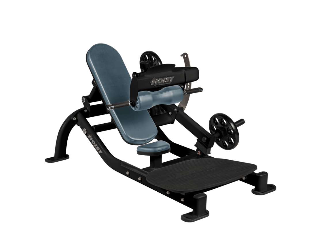 Angled view of BRD Matte Black glute thrust machine showing foot platform, seat, and weight plate loading positions