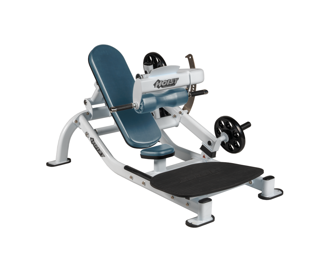 Angled view of BRD White glute thrust machine showing foot platform, seat, and weight plate loading positions