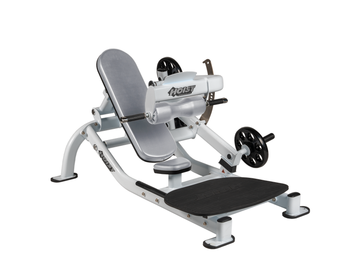 Angled view of DVG White glute thrust machine showing foot platform, seat, and weight plate loading positions