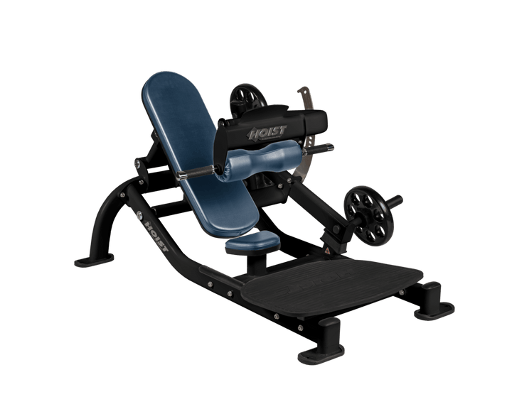 Angled view of NVY Matte Black glute thrust machine showing foot platform, seat, and weight plate loading positions