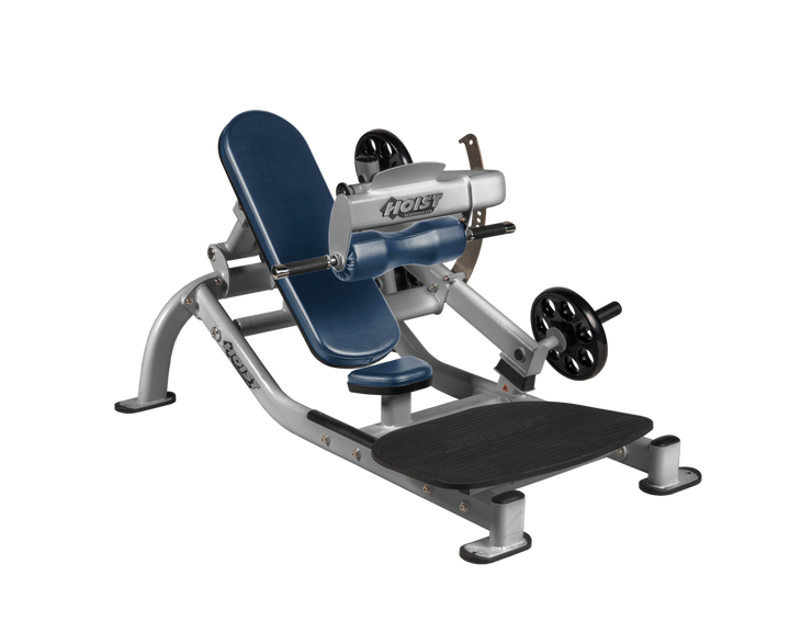 Angled view of NVY Platinum glute thrust machine showing foot platform, seat, and weight plate loading positions