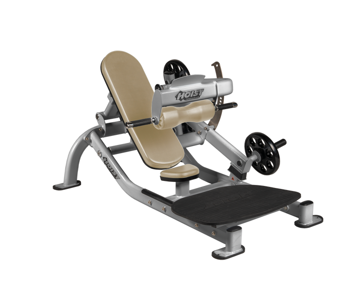 Angled view of SUE Platinum glute thrust machine showing foot platform, seat, and weight plate loading positions