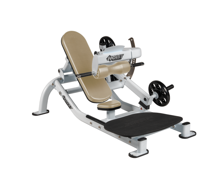 Angled view of SUE Platinum glute thrust machine showing foot platform, seat, and weight plate loading positions