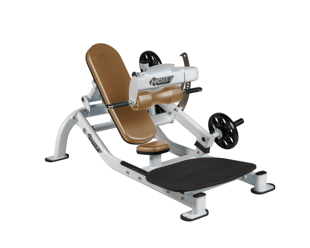 Angled view of WHT White glute thrust machine showing foot platform, seat, and weight plate loading positions