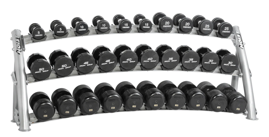 Three-tier platinum curved dumbbell rack fully loaded with dumbbells for high-capacity commercial storage