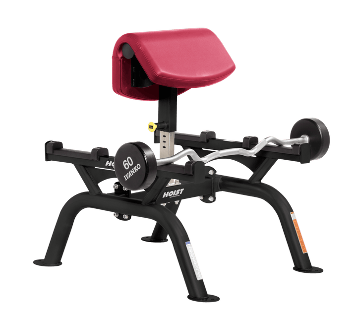 AMB Commercial standing preacher curl machine with angled arm pad and plate-loaded bar for focused bicep training