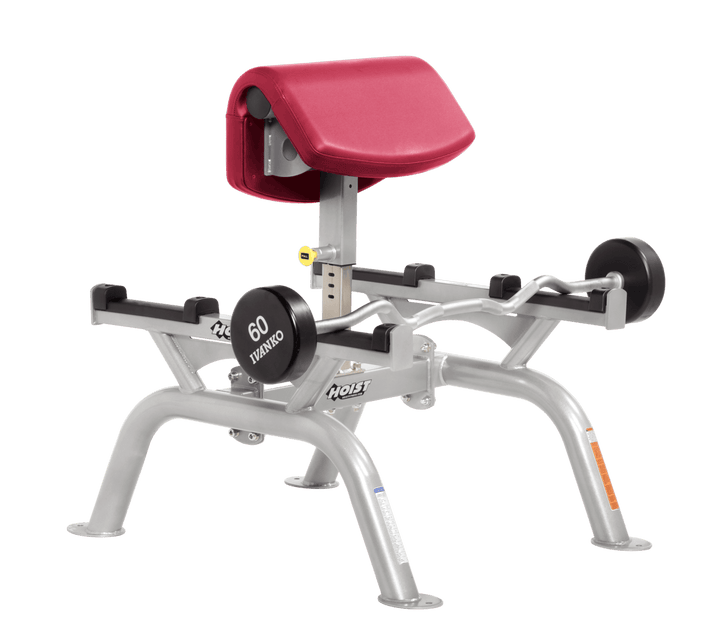 AMB Commercial standing preacher curl machine with platinum angled arm pad and plate-loaded bar for focused bicep training