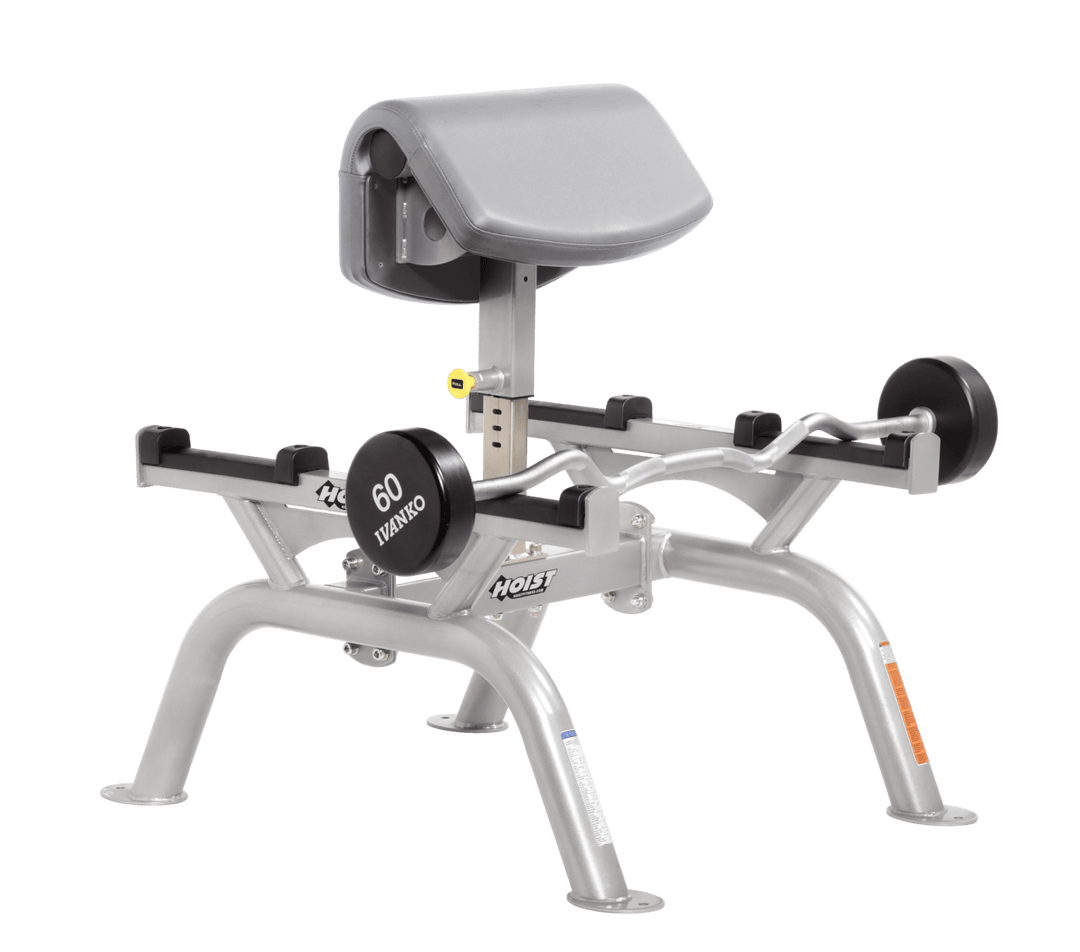 DVG Commercial standing preacher curl machine with platinum angled arm pad and plate-loaded bar for focused bicep training