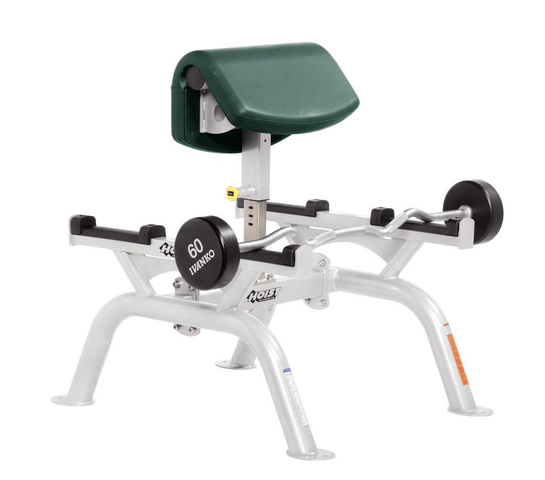 HGR Commercial standing preacher curl machine with white angled arm pad and plate-loaded bar for focused bicep training