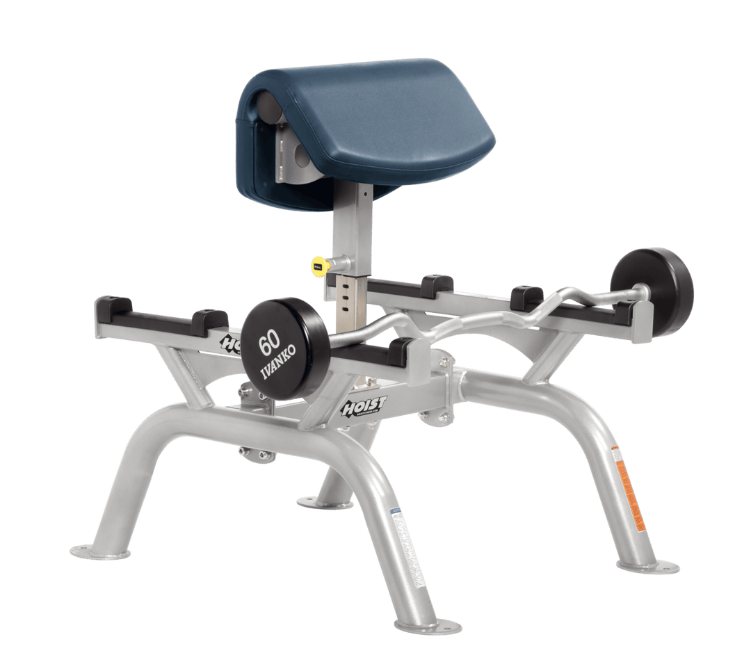 NVY Commercial standing preacher curl machine with platinum angled arm pad and plate-loaded bar for focused bicep training