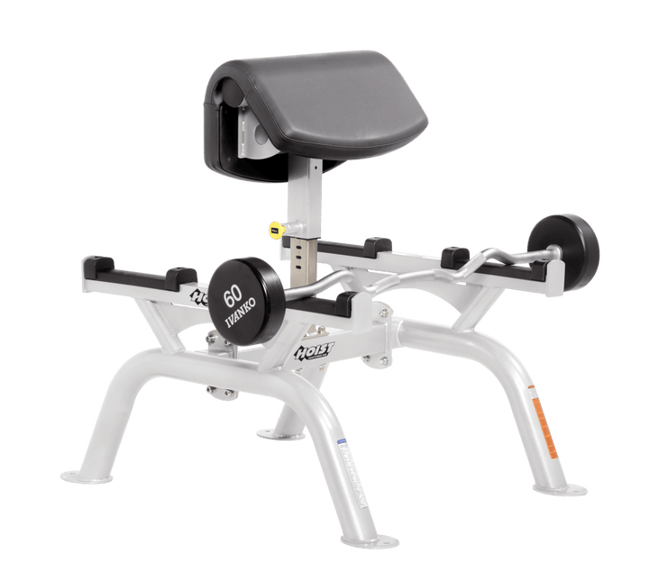 SLG Commercial standing preacher curl machine with white angled arm pad and plate-loaded bar for focused bicep training