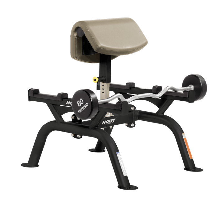 SUE Commercial standing preacher curl machine with angled arm pad and plate-loaded bar for focused bicep training