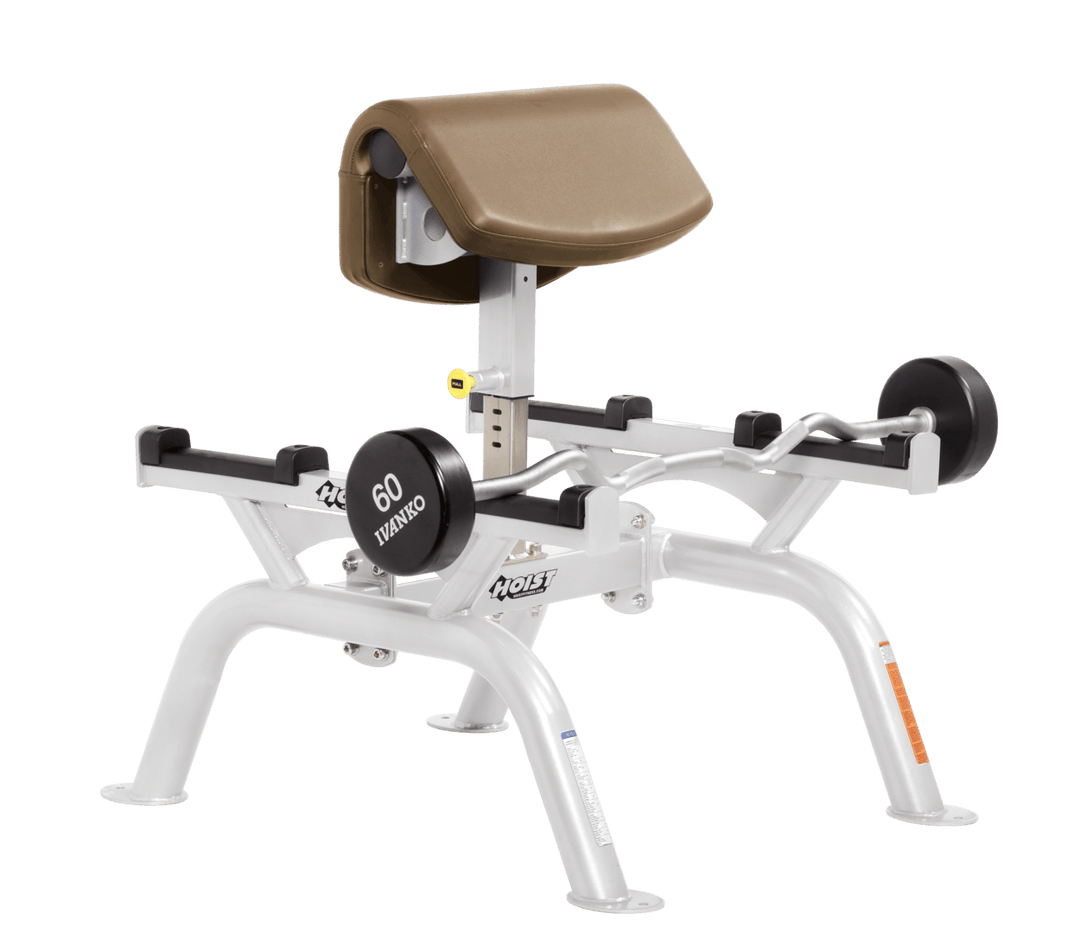 WHT Commercial standing preacher curl machine with white angled arm pad and plate-loaded bar for focused bicep training