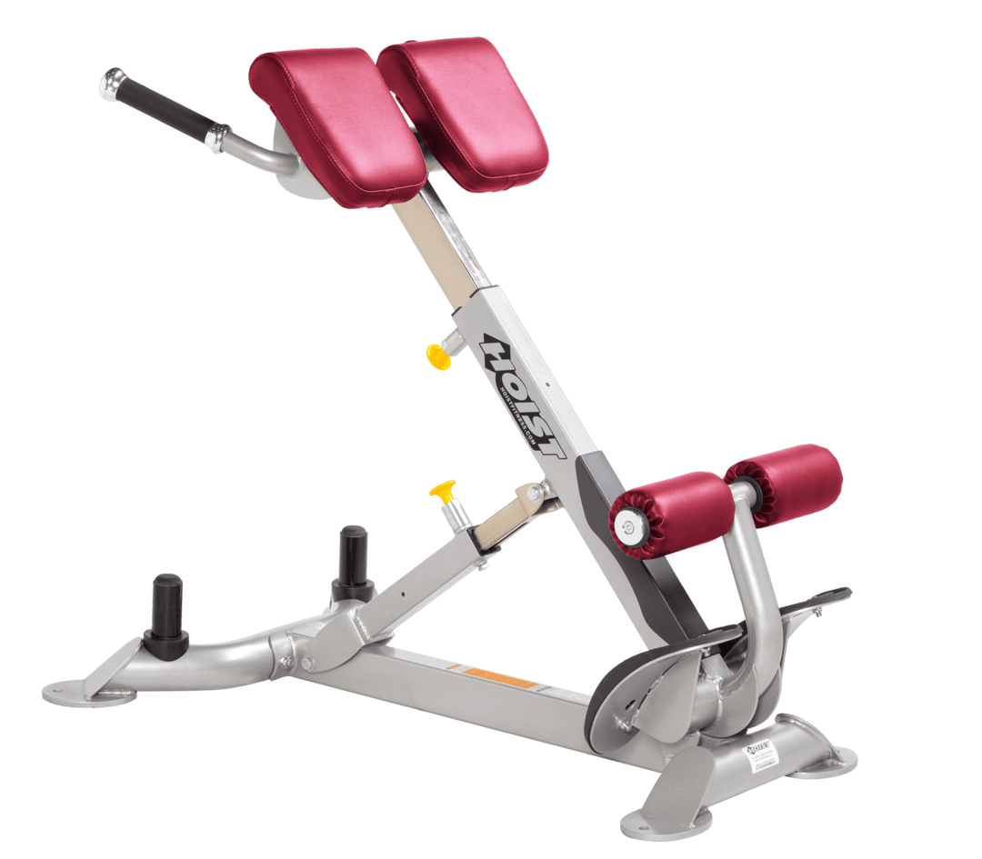 Commercial AMB platinum back hyperextension bench with angled pads and foot supports for lower back and core training