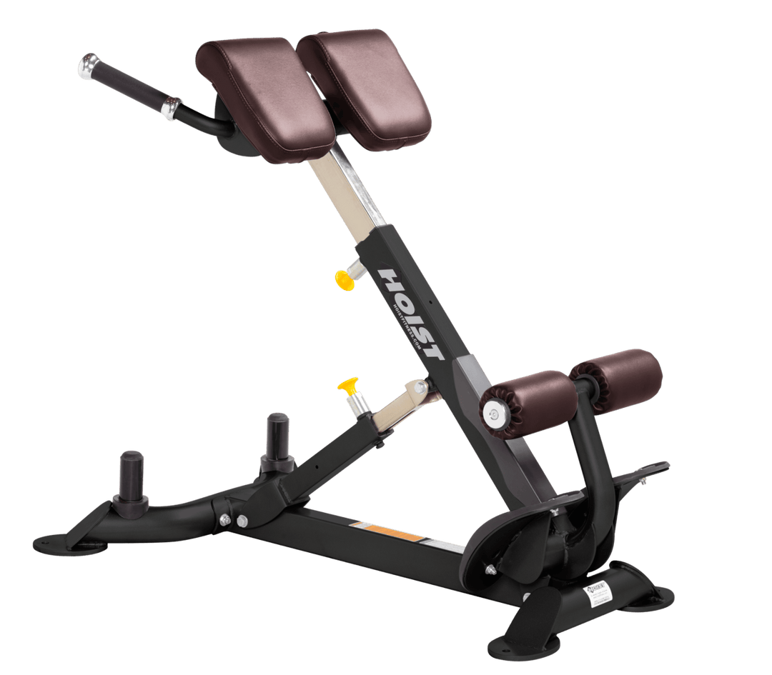 Commercial BRG back hyperextension bench with angled pads and foot supports for lower back and core training