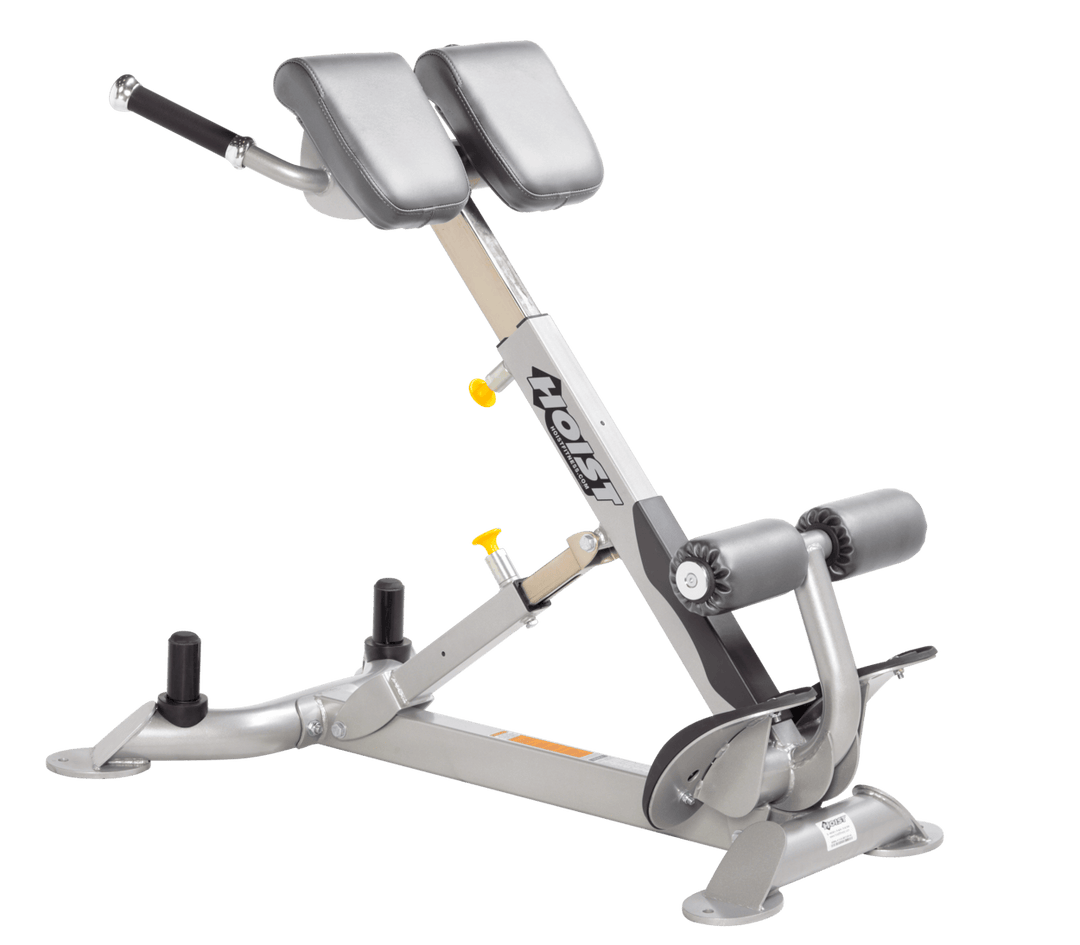 Commercial DVG platinum back hyperextension bench with angled pads and foot supports for lower back and core training