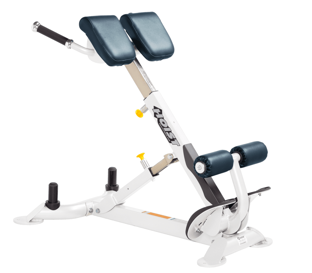 Commercial NVY white back hyperextension bench with angled pads and foot supports for lower back and core training