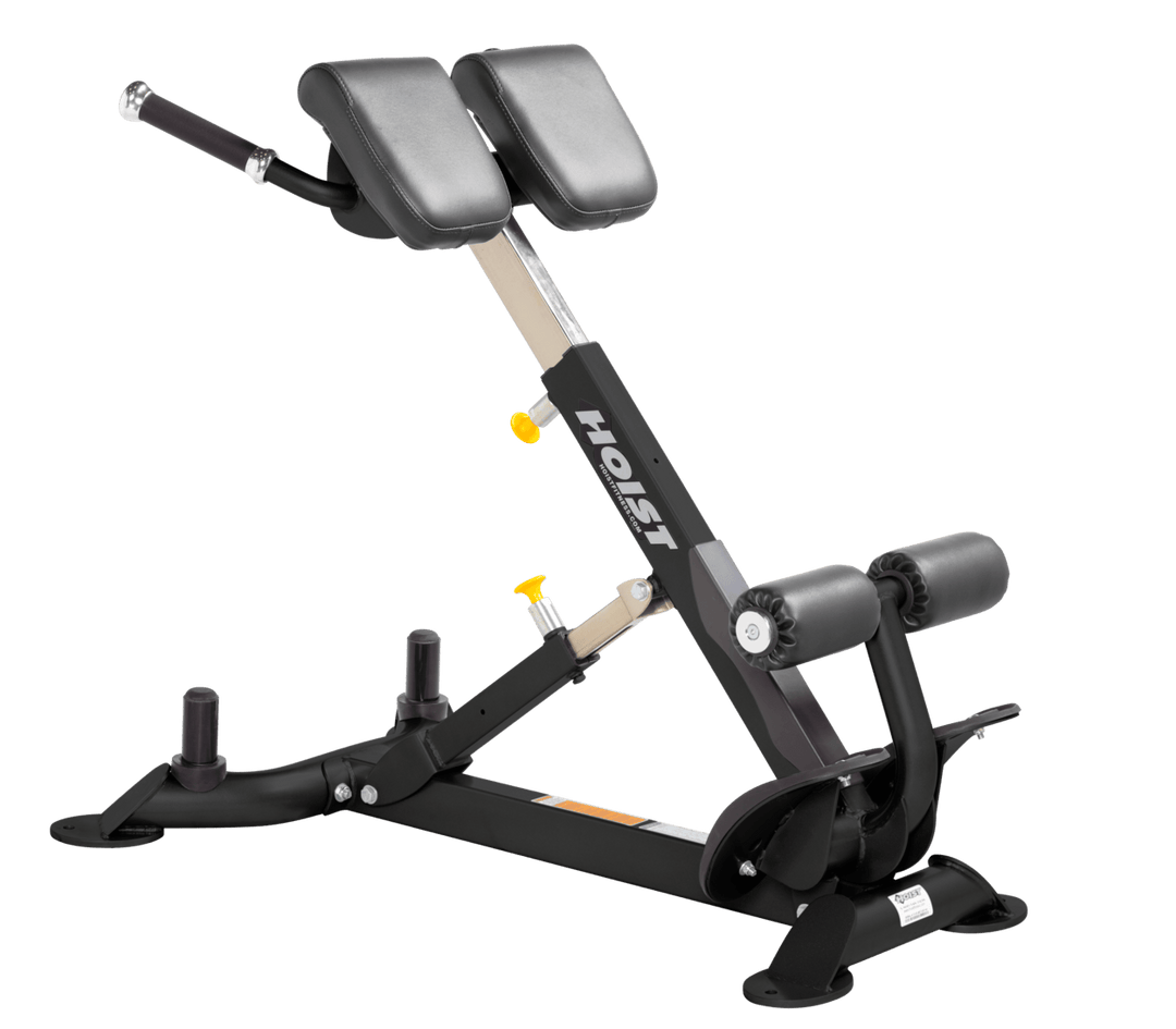 Commercial SLG back hyperextension bench with angled pads and foot supports for lower back and core training