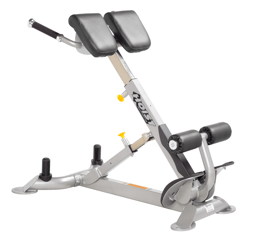 Commercial SLG platinum back hyperextension bench with angled pads and foot supports for lower back and core training