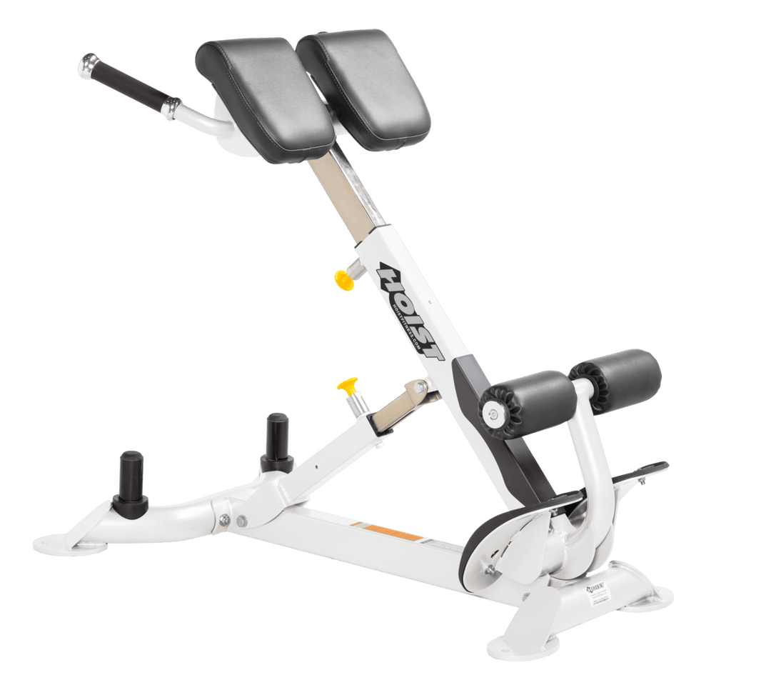 Commercial SLG white back hyperextension bench with angled pads and foot supports for lower back and core training