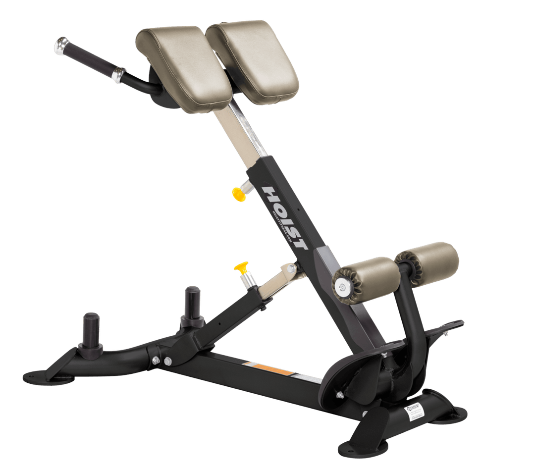 Commercial SUE back hyperextension bench with angled pads and foot supports for lower back and core training