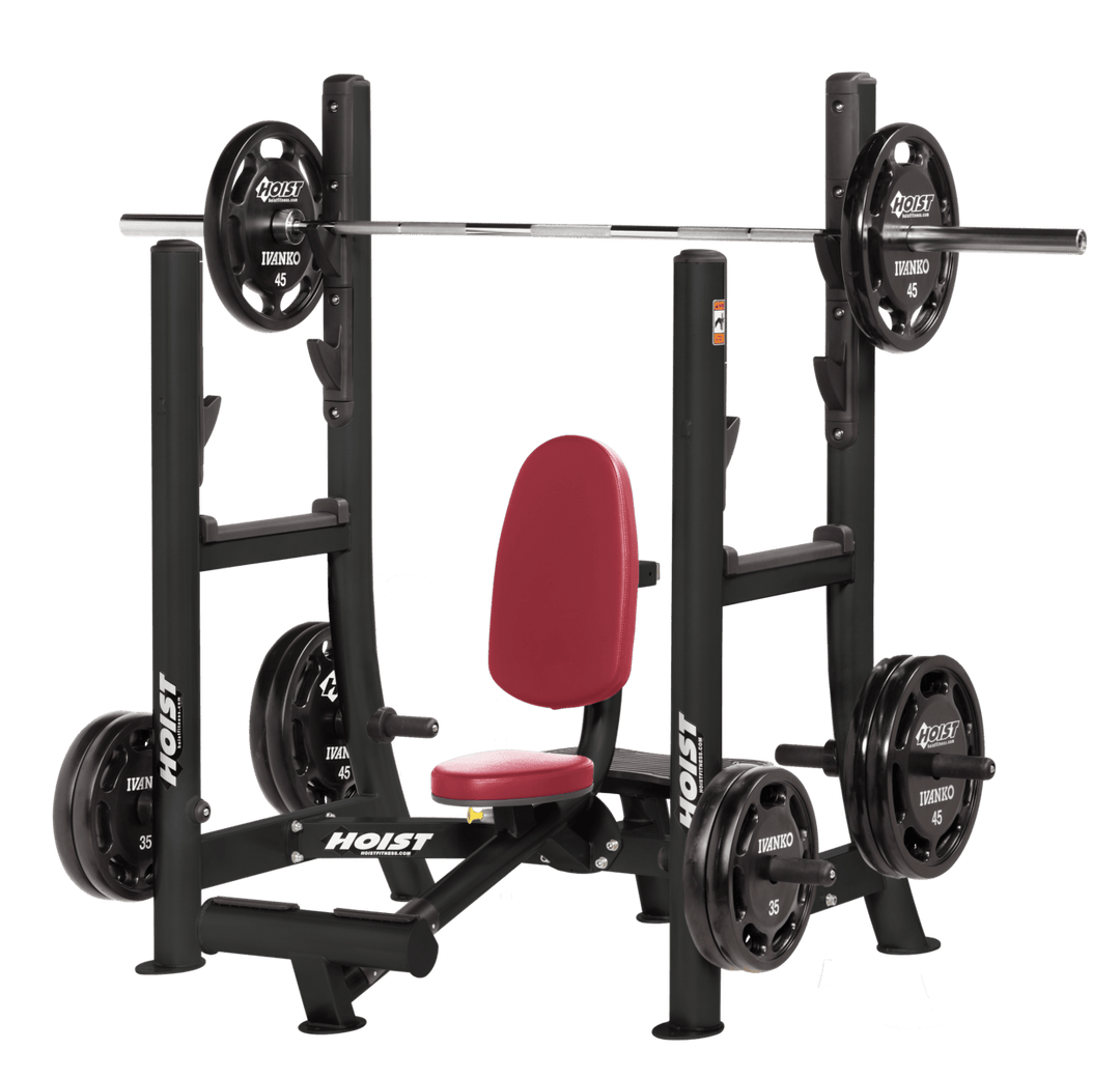 Commercial AMB military press machine with seated back support and plate-loaded arms for shoulder strength training