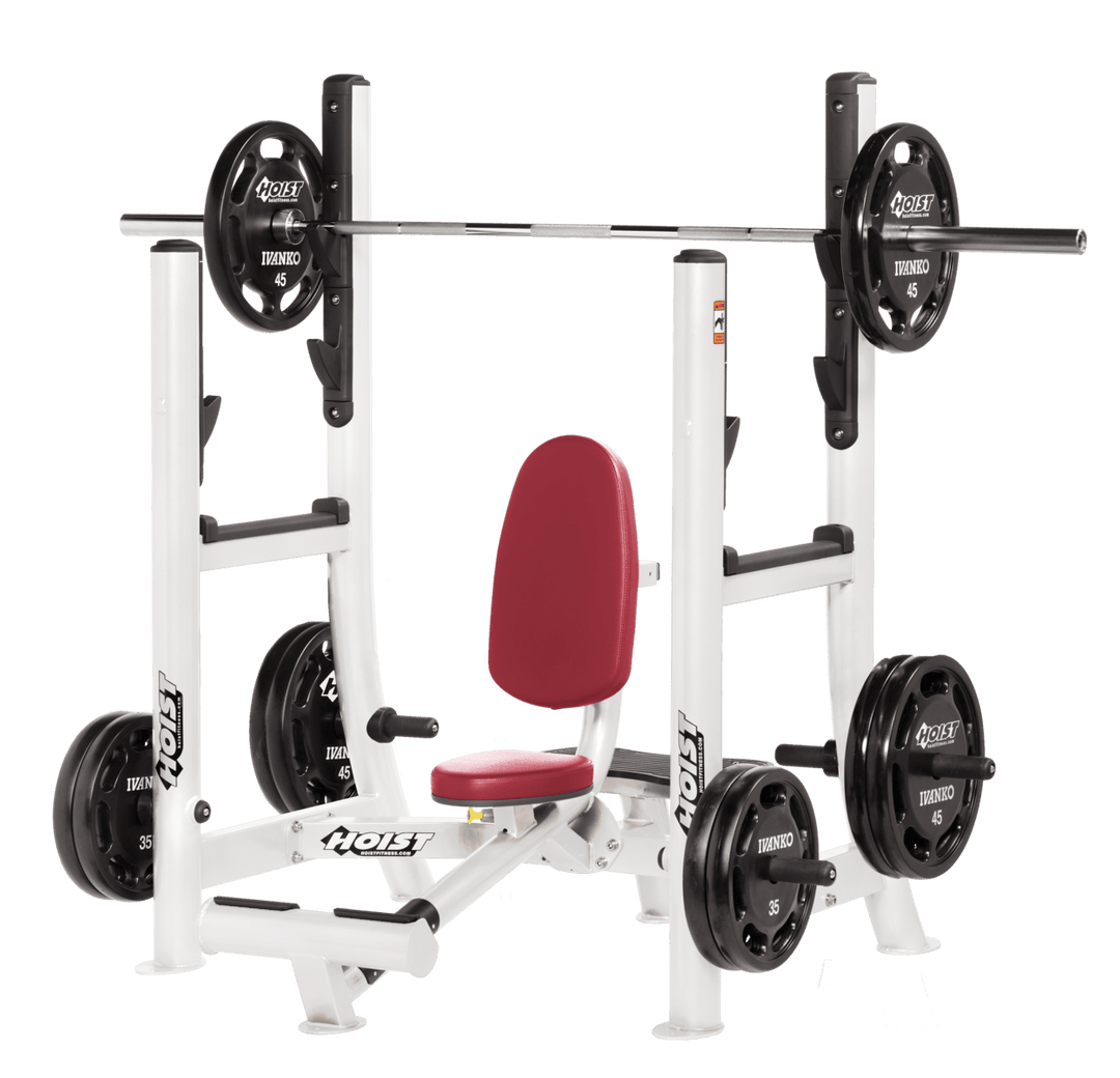 Commercial AMB white military press machine with seated back support and plate-loaded arms for shoulder strength training