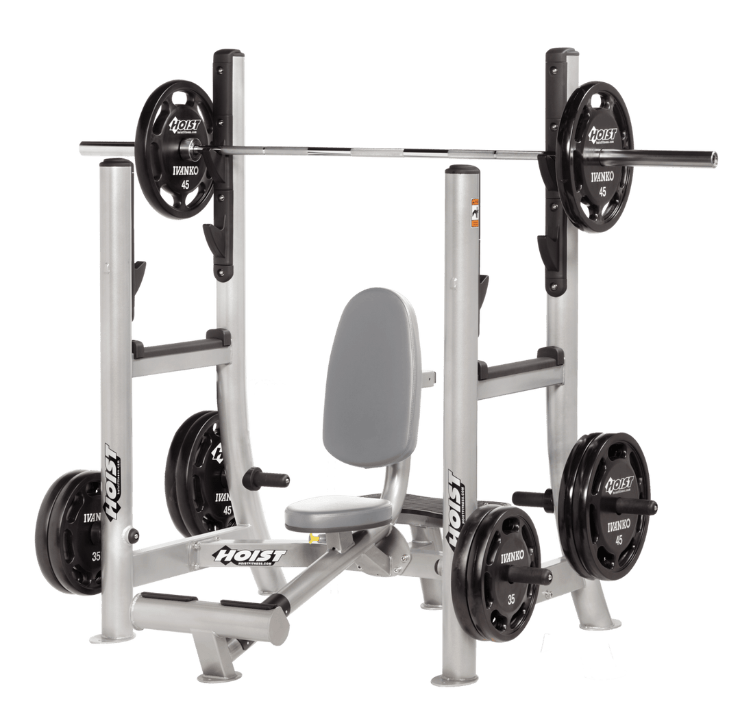 Commercial DVG Platinum military press machine with seated back support and plate-loaded arms for shoulder strength training