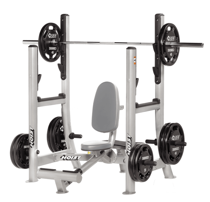 Commercial DVG Platinum military press machine with seated back support and plate-loaded arms for shoulder strength training