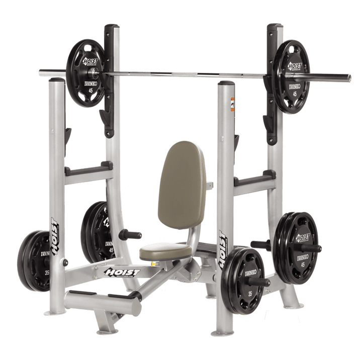 Commercial SUE Platinum military press machine with seated back support and plate-loaded arms for shoulder strength training