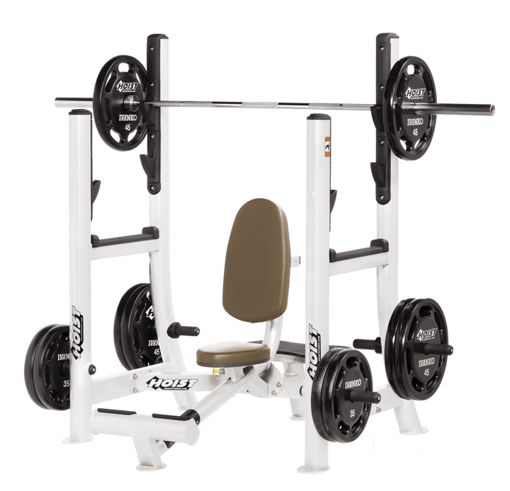 Commercial WHT white military press machine with seated back support and plate-loaded arms for shoulder strength training