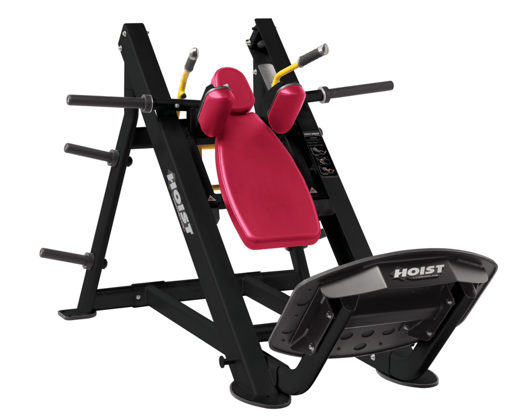AMB Commercial hack squat machine with angled backrest, shoulder pads, and footplate for lower body strength training