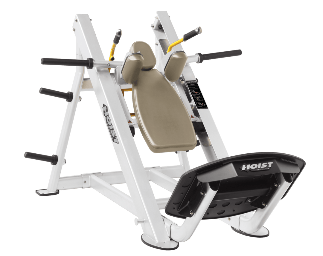 SUE White Commercial hack squat machine with angled backrest, shoulder pads, and footplate for lower body strength training