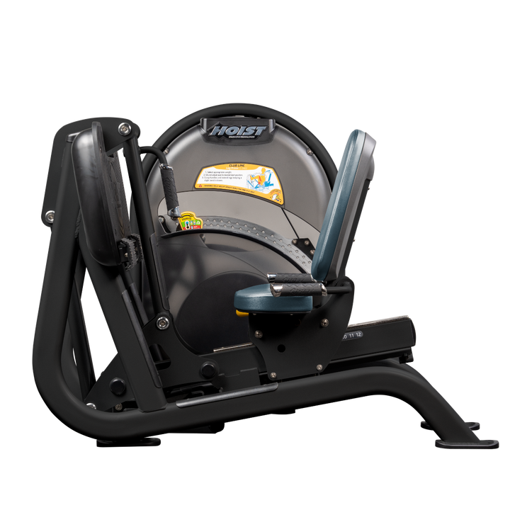 Seated leg press machine with angled foot platform and back support for lower body strength training