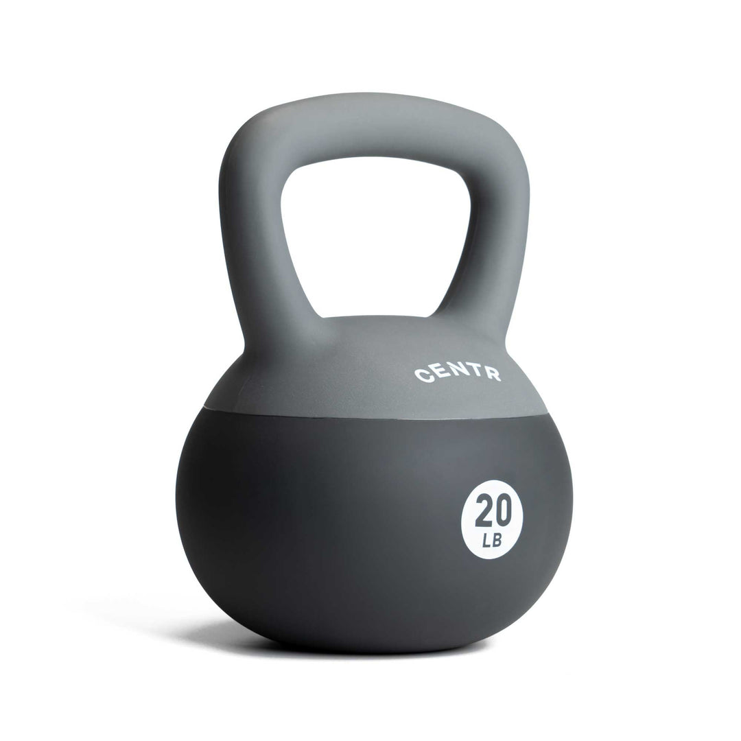 Centr 20 lb soft round kettlebell with black and grey molded PVC body and wide handle