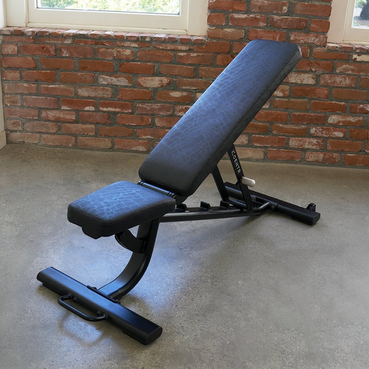 Centr adjustable workout bench in an incline position inside a home strength training space
