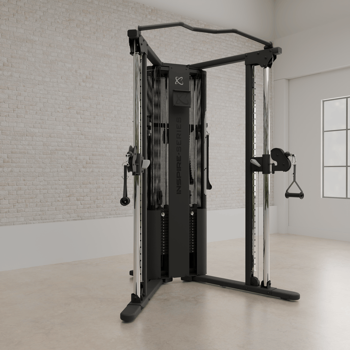 Centr Inspire FT1 PRO functional trainer with adjustable cable arms positioned outward for training