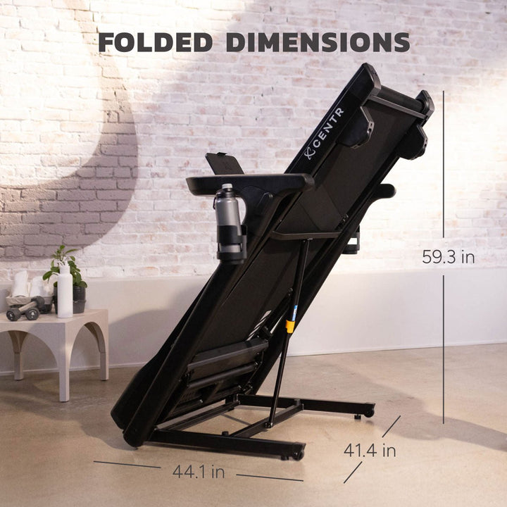 Centr Runr folding treadmill in its folded position with folded dimensions displayed