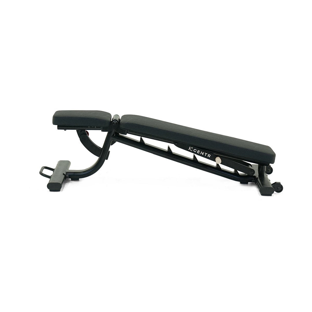 Centr adjustable workout bench set at a low incline with adjustable back and seat pads