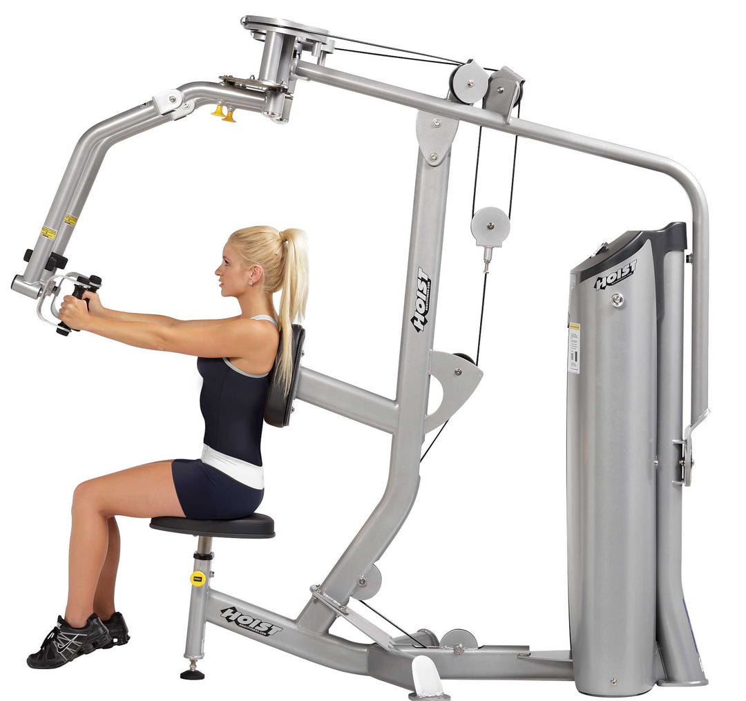 user performing wide chest fly movement on pec fly rear delt machine