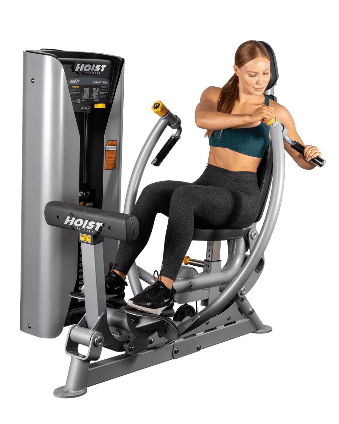 woman performing chest press exercise showing correct pushing motion and upper body positioning