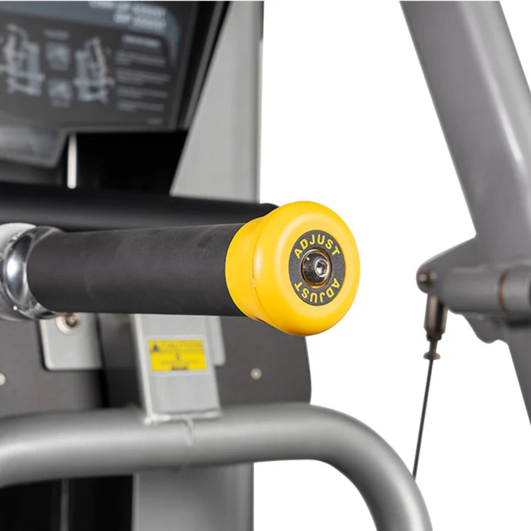 close up of chin dip assist machine handles and knee pad for support during exercise