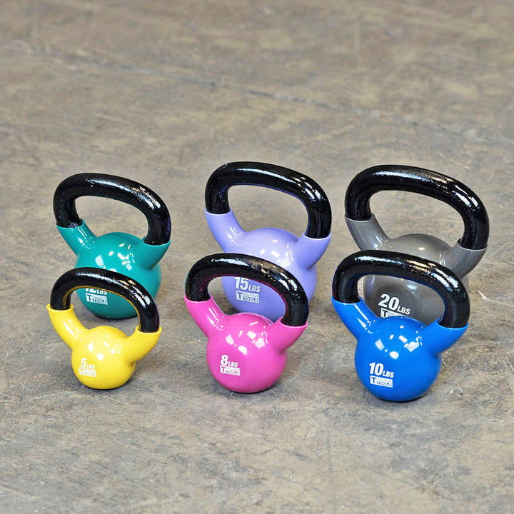 Colorful kettlebells in multiple weights displayed together