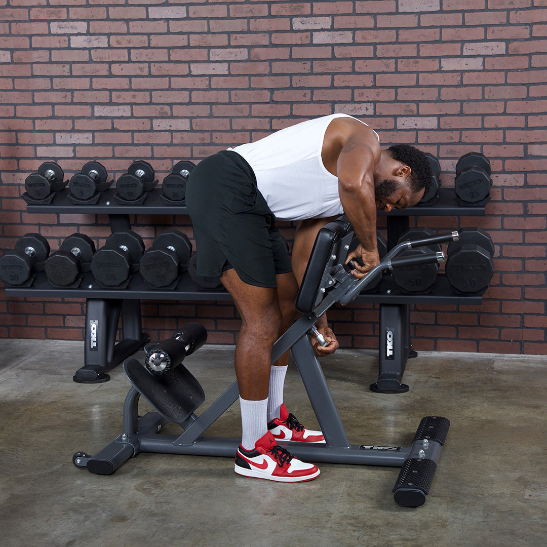 User performing exercise on commercial hyper extension bench
