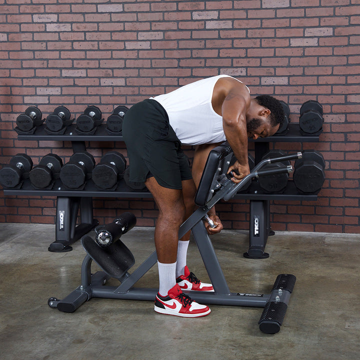 User performing exercise on commercial hyper extension bench