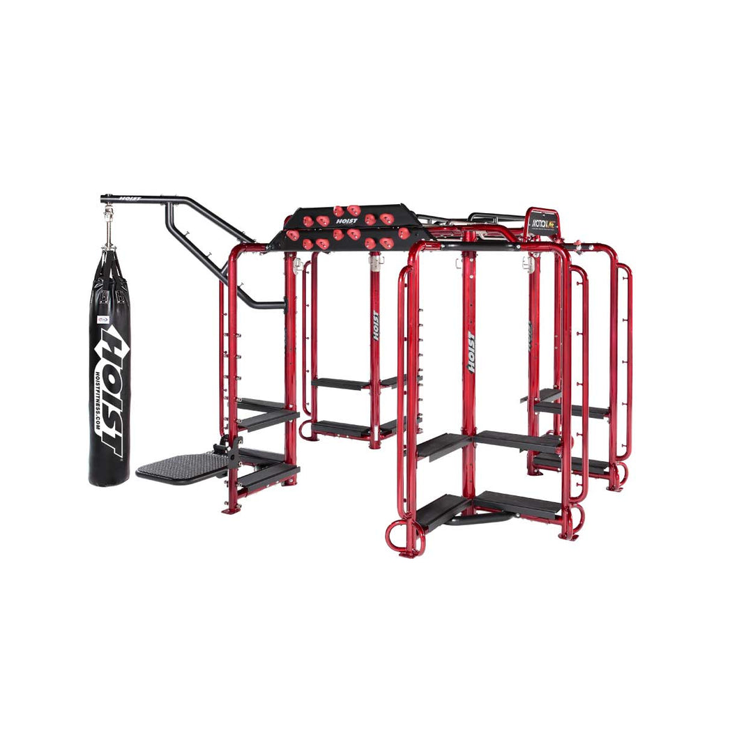 multi-user functional training cage with pull-up handles, workout platforms, and integrated commercial fitness accessories